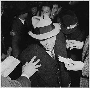 Dorothea Lange, stepping on to the bus for the assembly centre, April 6, 1942, San Francisco Dorothea Lange, stepping on to the bus for the assembly centre, April 6, 1942, San Francisco