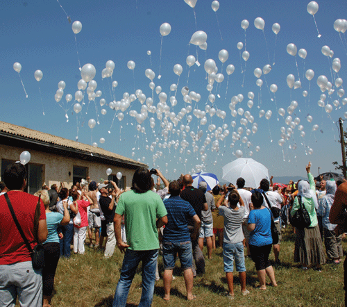 A memorial event at Omarska for victims of the war in Bosnia. Photo by Kemal Pervanić. Omarska