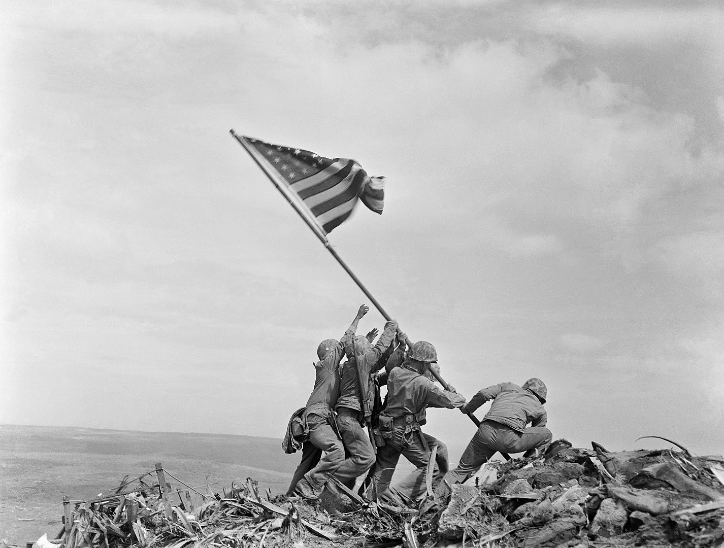 US marines raise the American flag on the Japanese island of Iwo Jima, 1945. Credit: Joe Rosenthal Six US marines raise the American flag on Iwo Jima after capturing the island from the Imperial Japanese Army during the Second World War