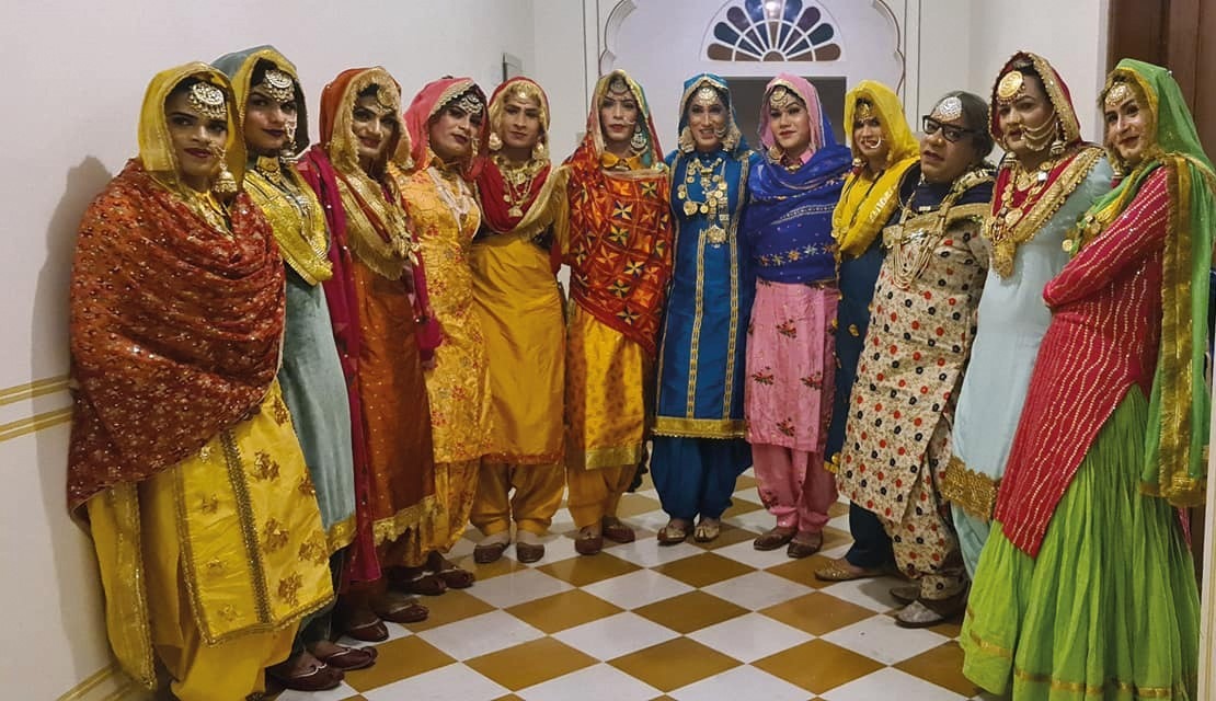 Noor Zora, centre, and the troupe. Photo courtesy of Noor Zora The troupe, dressed in colourful gowns, pose for a photograph
