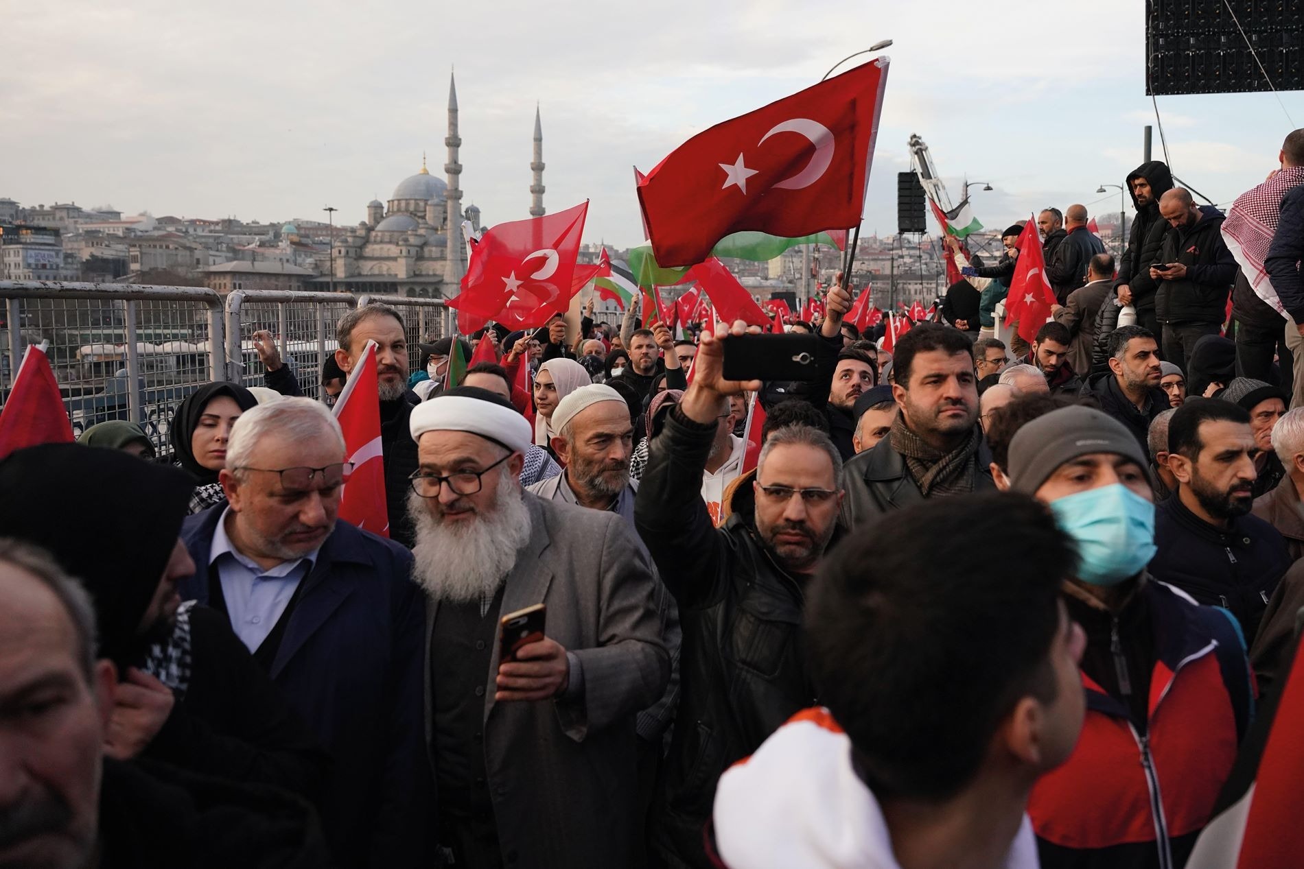 Crowds of protestors waving Palestinian and Turkish flags march in central Istanbul, January 2024