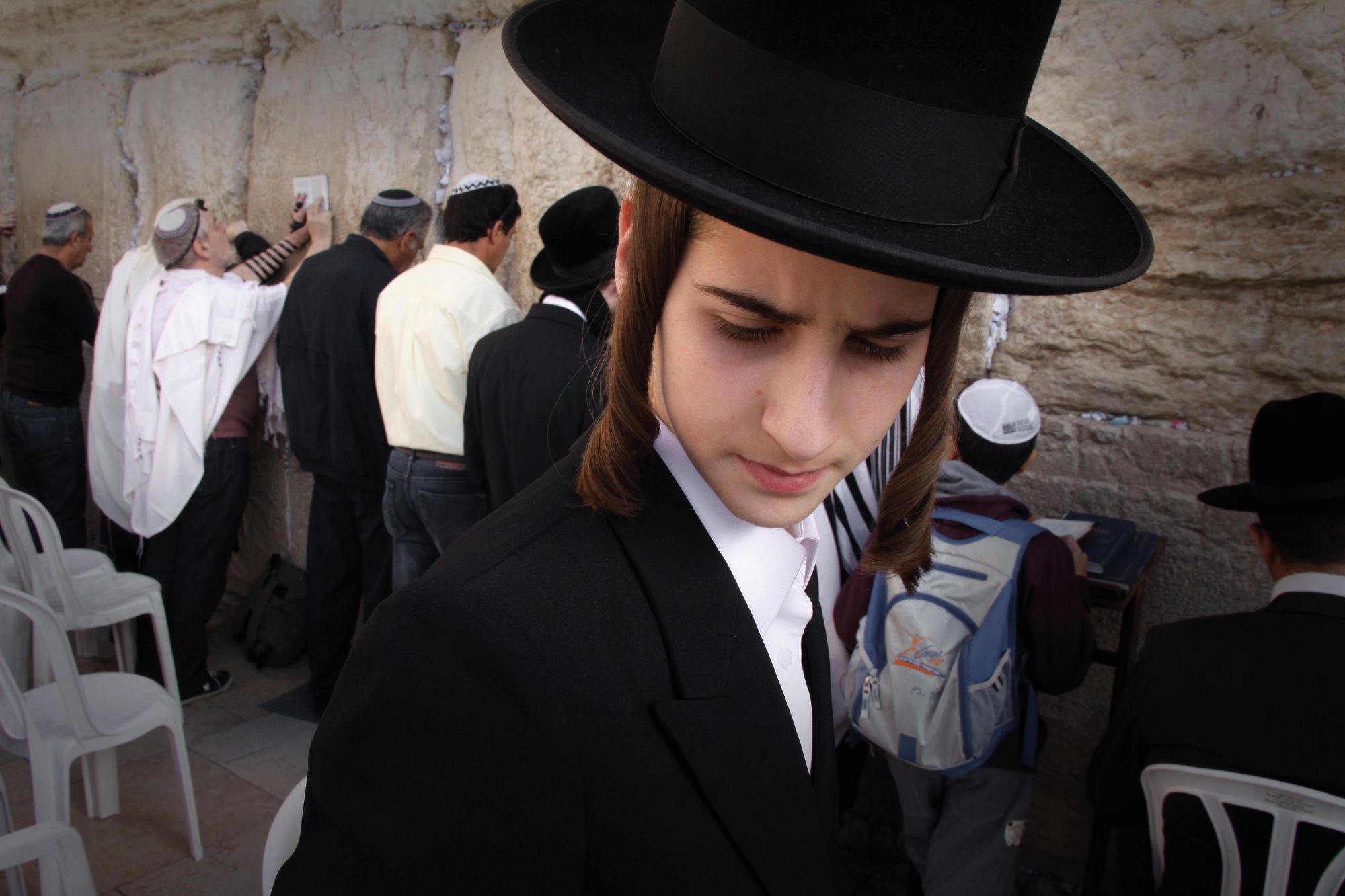 Jewish men pray at the Western Wall in Jerusalem. Credit: Alamy Jewish men pray at the Western Wall in Jerusalem