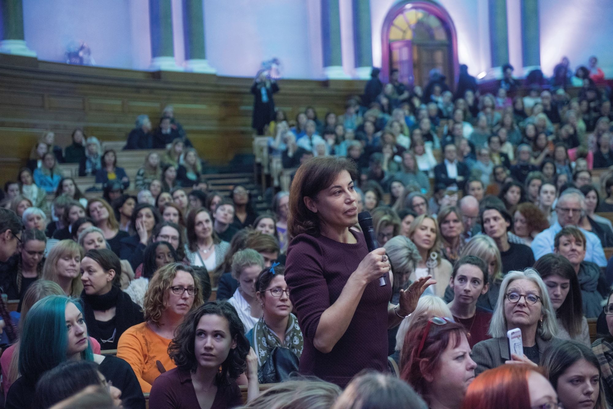 Natasha Walter speaks into a microphone