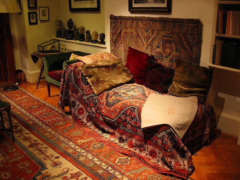 Freud's famous couch. Credit: Robert Huffstutter Freud's famous couch, draped in cushions and carpets