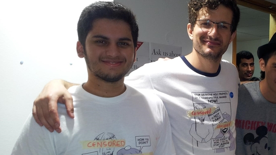 Abhishek Phadnis and Chris Moos were asked to cover their Jesus & Mo t-shirts at LSE Freshers Fair LSE students in Jesus & Mo shirts