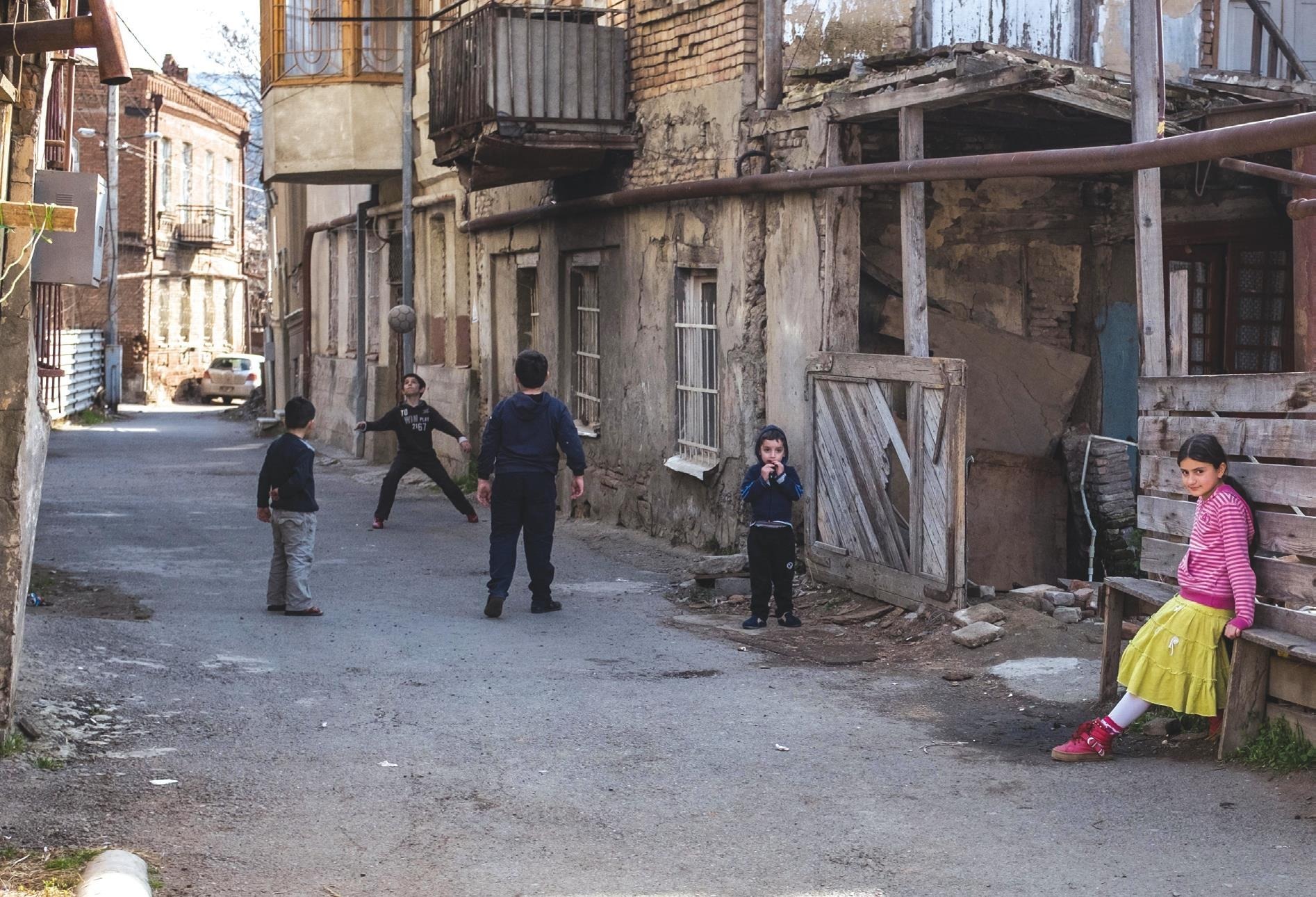 Children playing street football in Tbilisi, Georgia