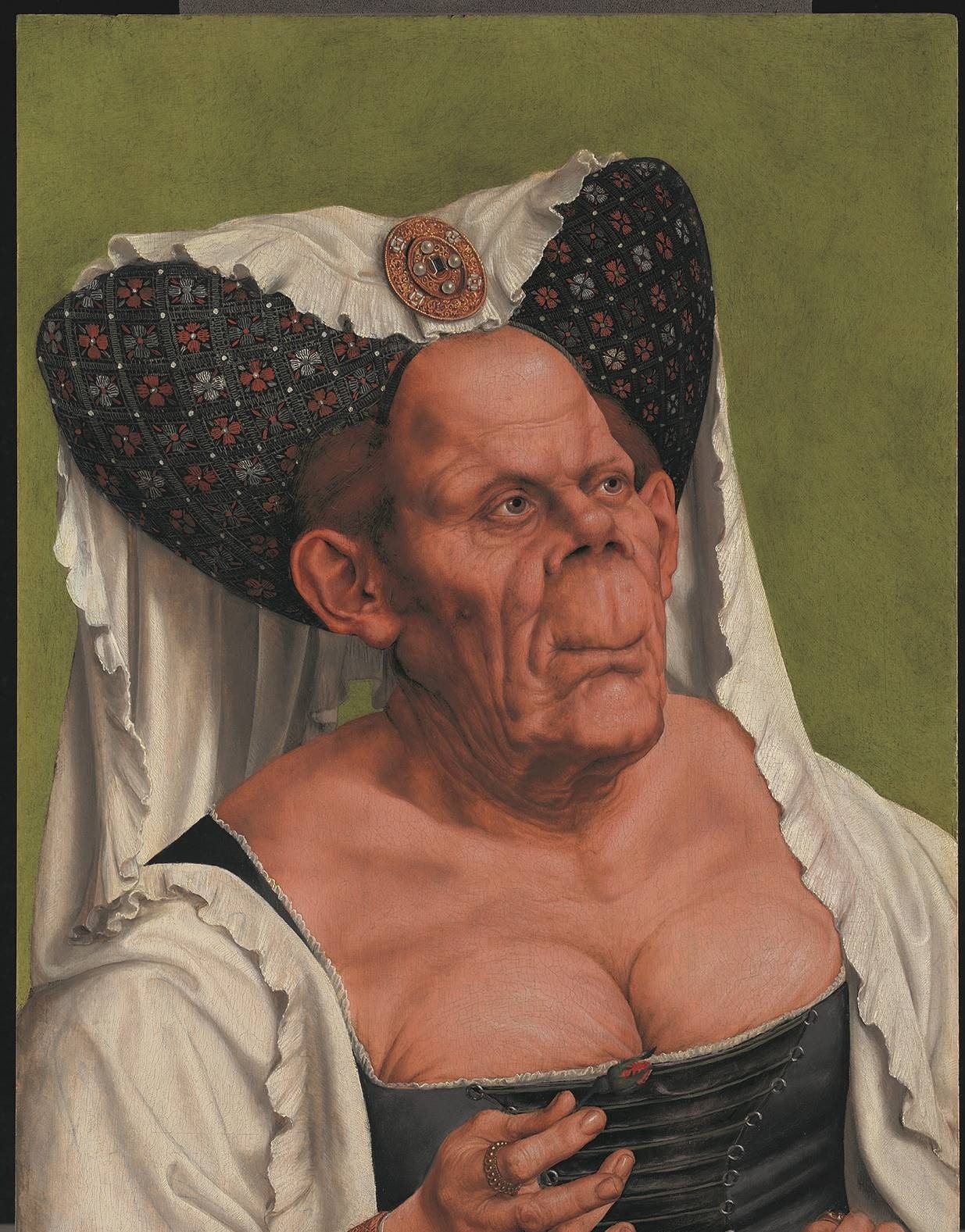 'An Old Woman', or 'The Ugly Duchess', by Quinten Massys. Copyright: The National Gallery 'An Old Woman' - commonly known as 'The Ugly Duchess' - by Quinten Massys. The portrait depicts an old woman with exaggerated features, including a bulging forehead and bosom squeezed into an ill-fitting corset