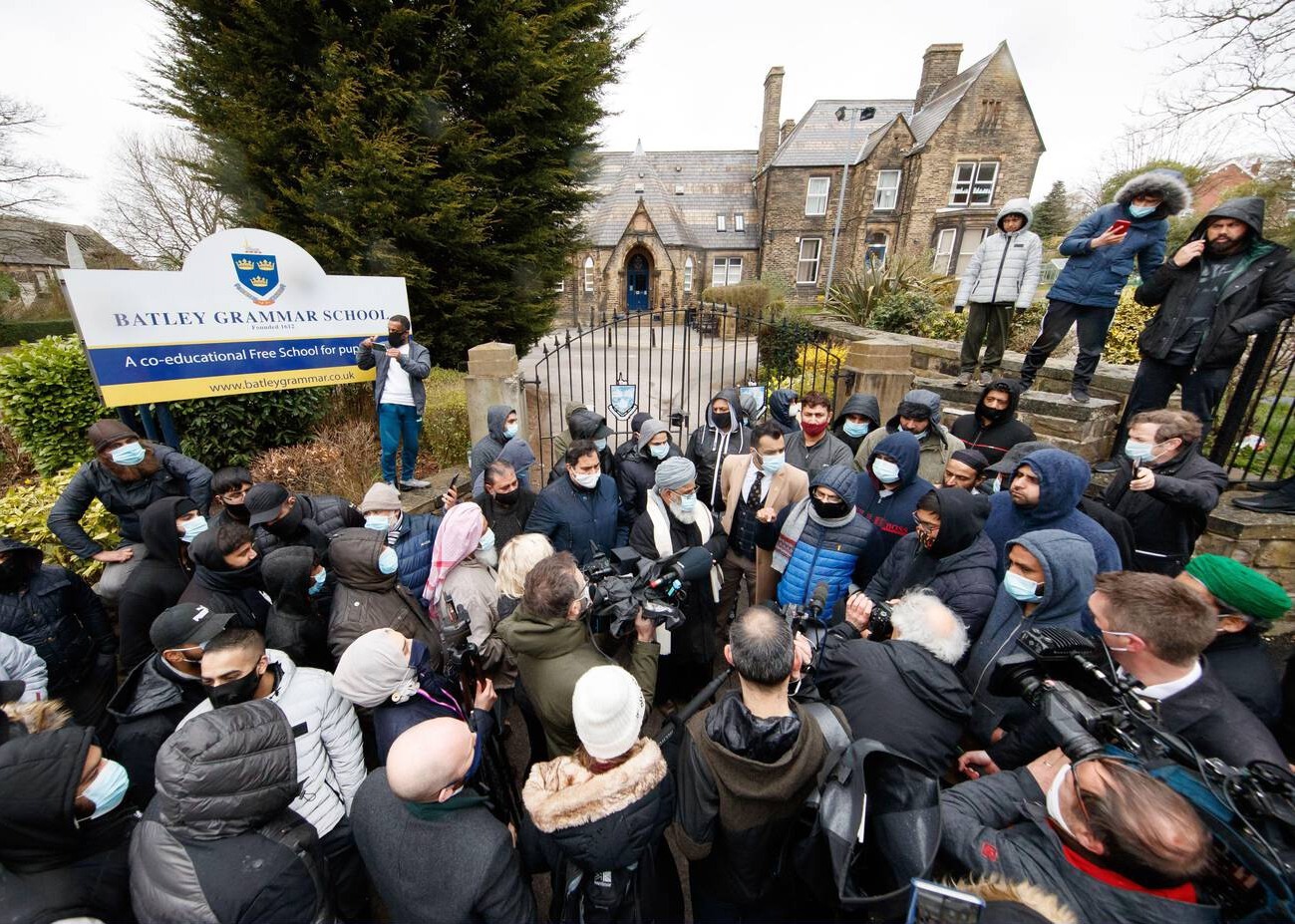 Protesters at Batley Grammar School, demanding the dismissal of a teacher for showing a controversial cartoon batley