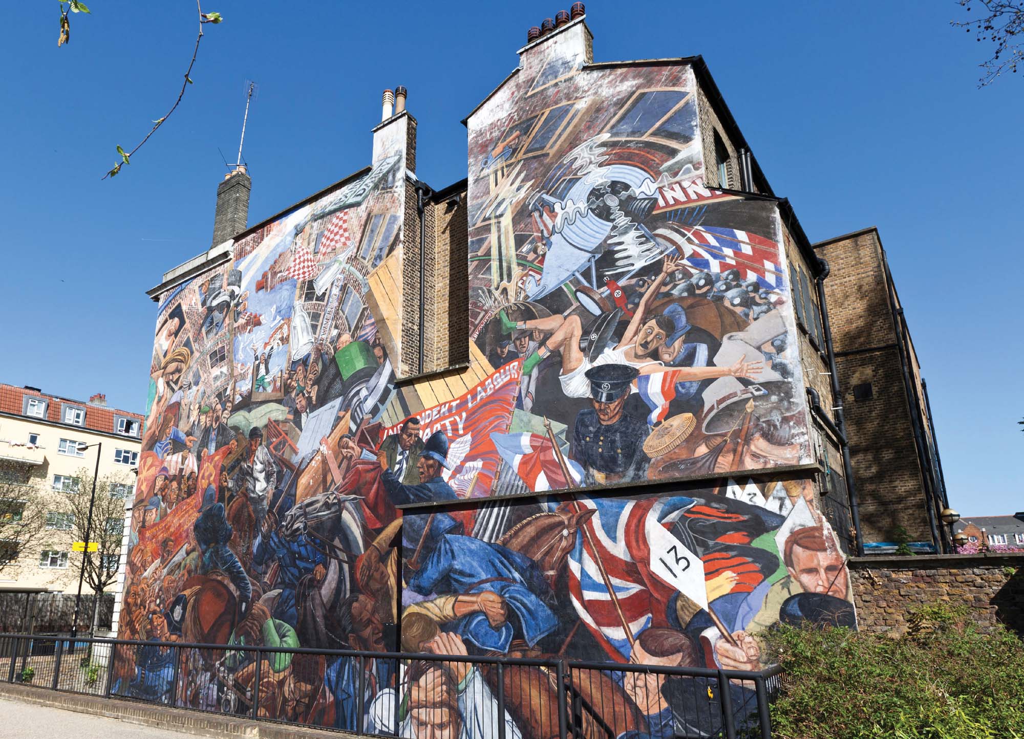 The anti-fascist Battle of Cable Street mural in east London, created by artist Dave Binnington Cable Street