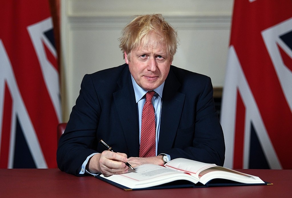 Boris Johnson is a repeat resigner. Credit: 10 Downing Street/Open Government Licence Boris Johnson signs the Brexit Withdrawal Agreement