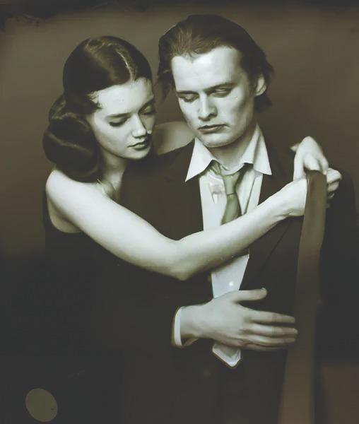 An AI-generated image from Boris Eldagsen's controversial ongoing series, 'Pseudomnesia' An AI-generated image from Boris Eldagsen's controversial ongoing series, 'Pseudomnesia', which shows a black and white, hyper-realistic image of a man and a woman with their arms around each other