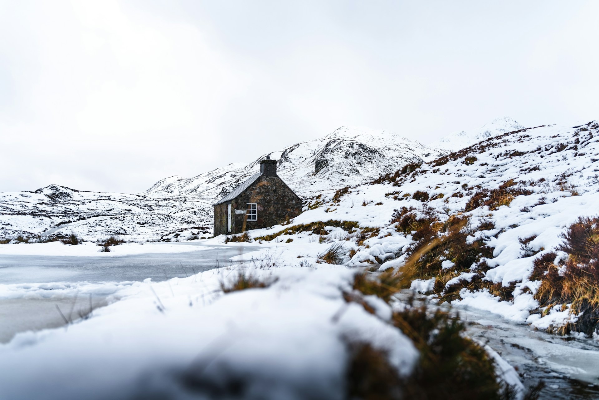 Credit: James Eades via Unsplash A snow-covered bothy in Blairgowrie, Scotland
