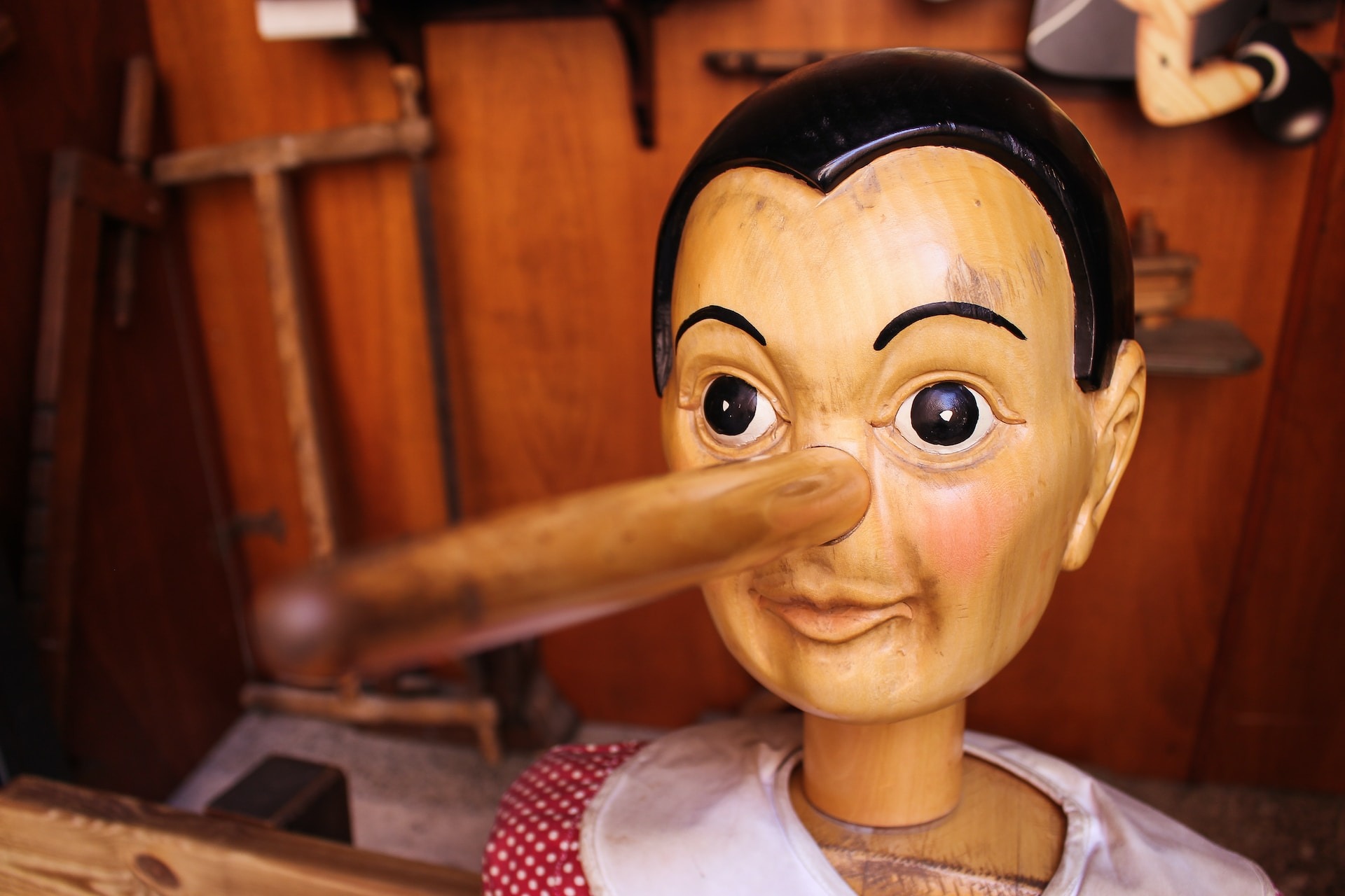 Credit: Jametlene Reskp via Unsplash A wooden puppet of Pinocchio with a long nose