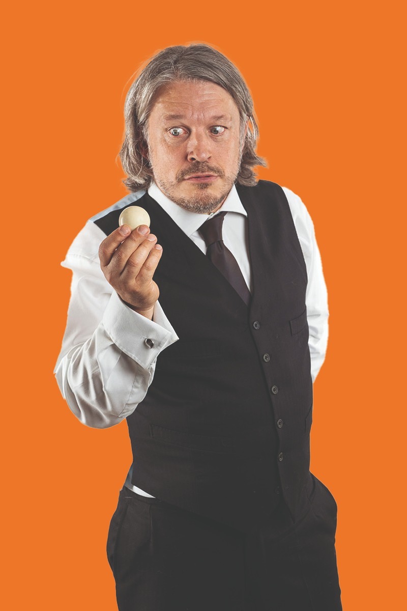 Credit: Steve Bright Richard Herring holds a snooker ball