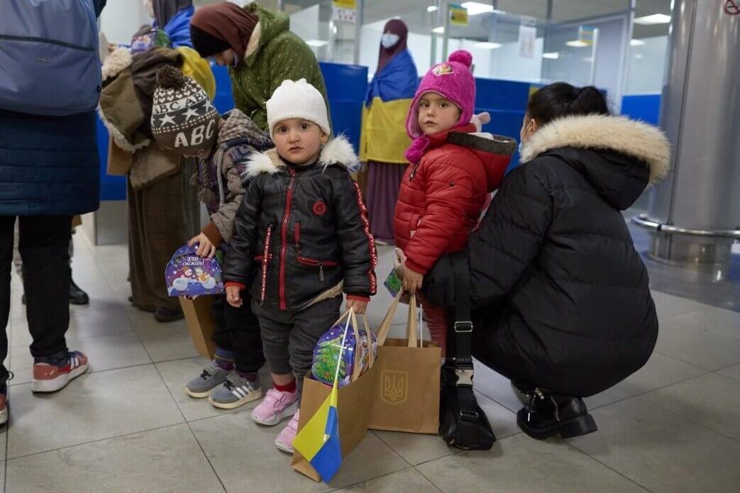 Ukrainian women and children refugees at a checkpoint Ukrainian refugees at a checkpoint